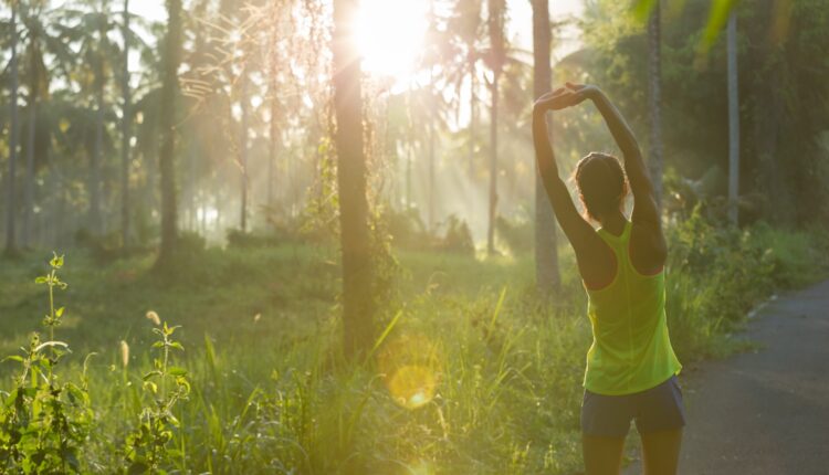 Fitness,Young,Woman,Runner,Warming,Up,Before,Run,On,Morning